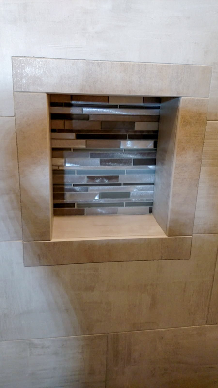 Custom shower niche with glass mosaic in Dalton Gardens, Idaho