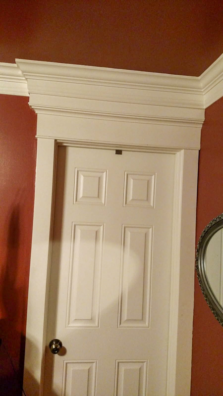 Paneled door with layered crown molding in Spokane