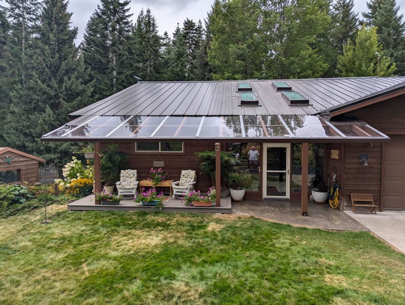 Covered outdoor living patio with metal roof in Coeur d'Alene, Idaho
